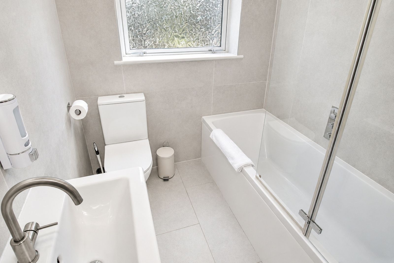 Bathroom with bath and shower